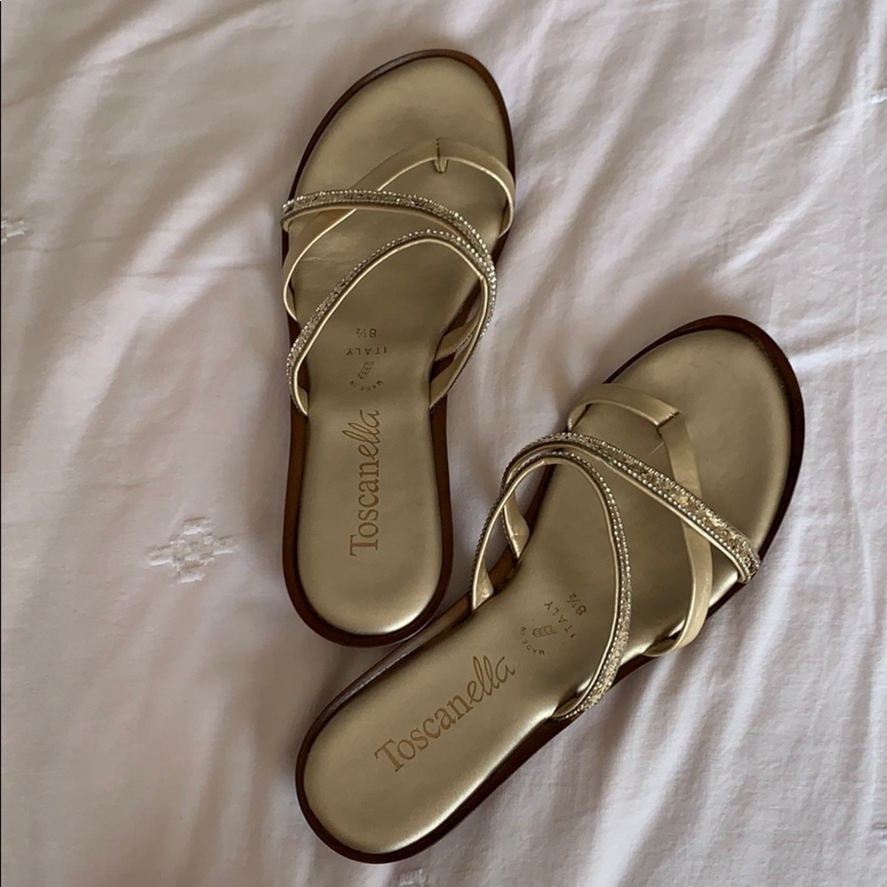 Gold flip-flop sandals